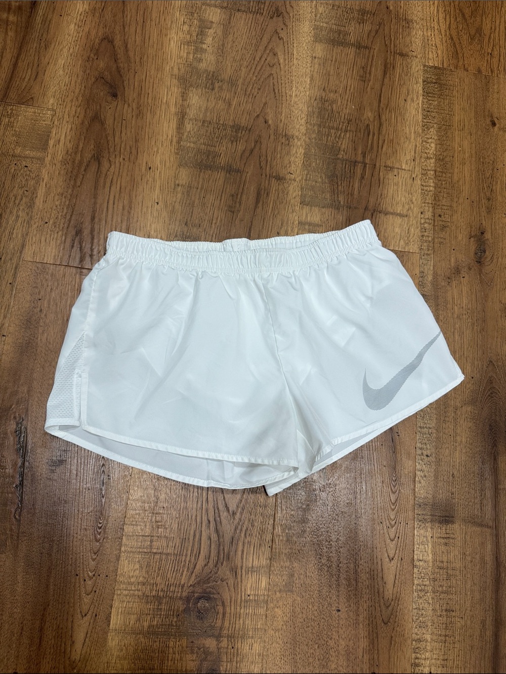 Nike White Women's Lightweight Running Shorts with Silver Swoosh